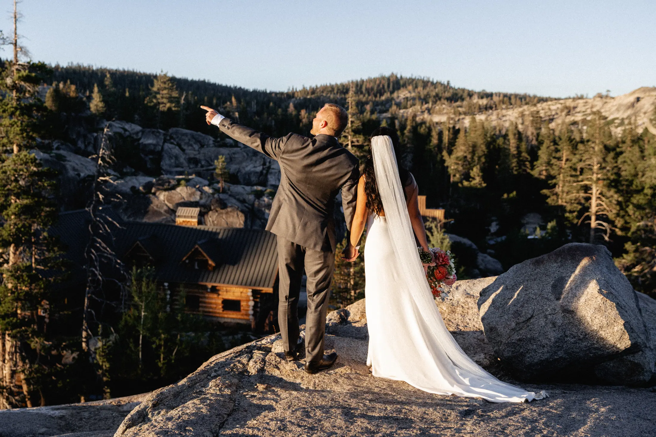 A veil caught by the wind on the granite above the lake.