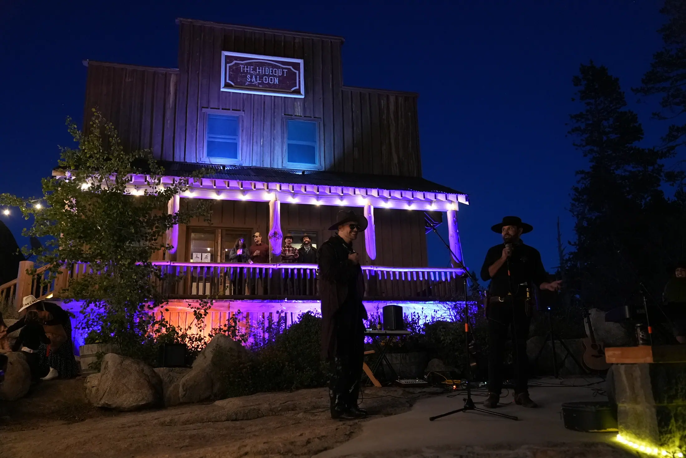 The saloon lit up after dark.